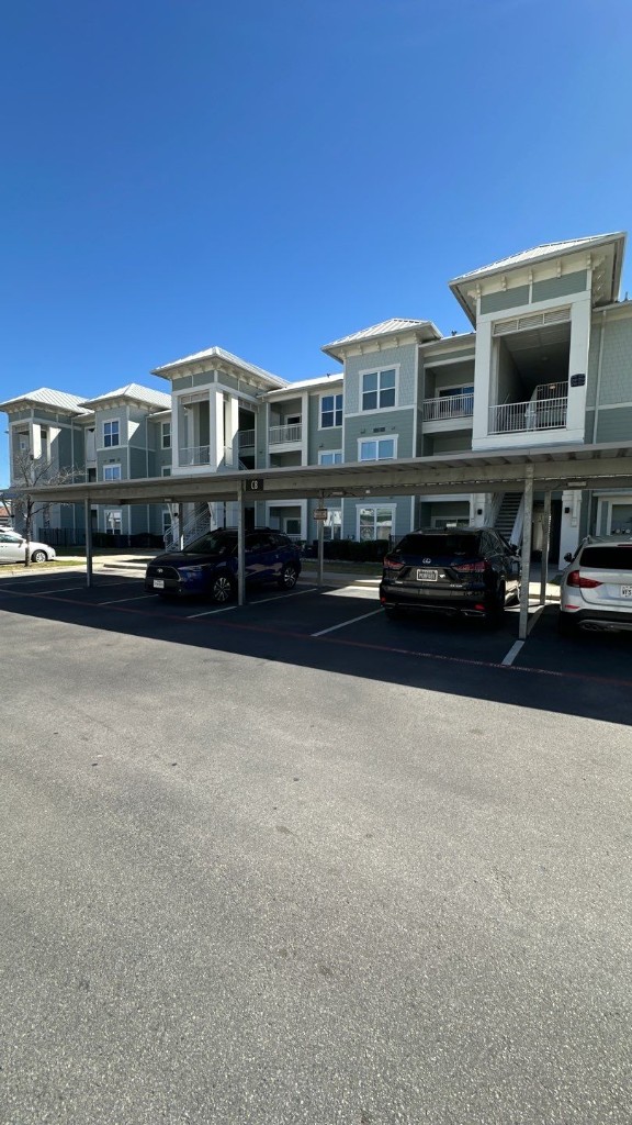 Freshly painted apartment exterior with modern finish and protected surfaces